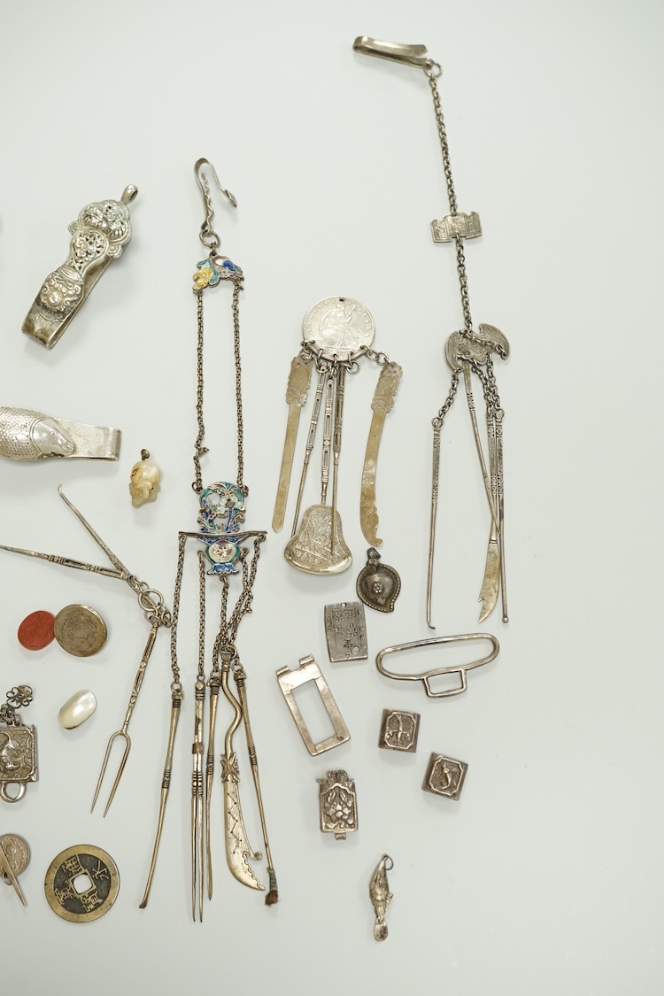 A collection of Chinese Straits white metal hooks, a chatelaine, South East Asian coinage and other items, etc.